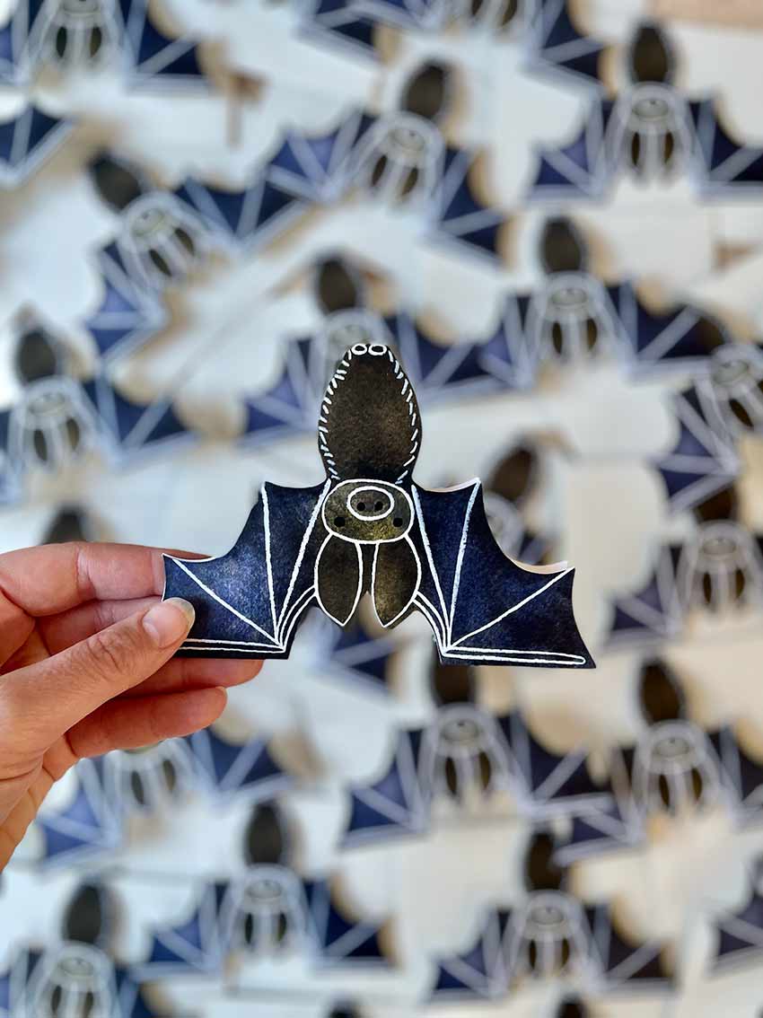 bestselling eco-friendly bat shaped card against a backdrop of bat cards