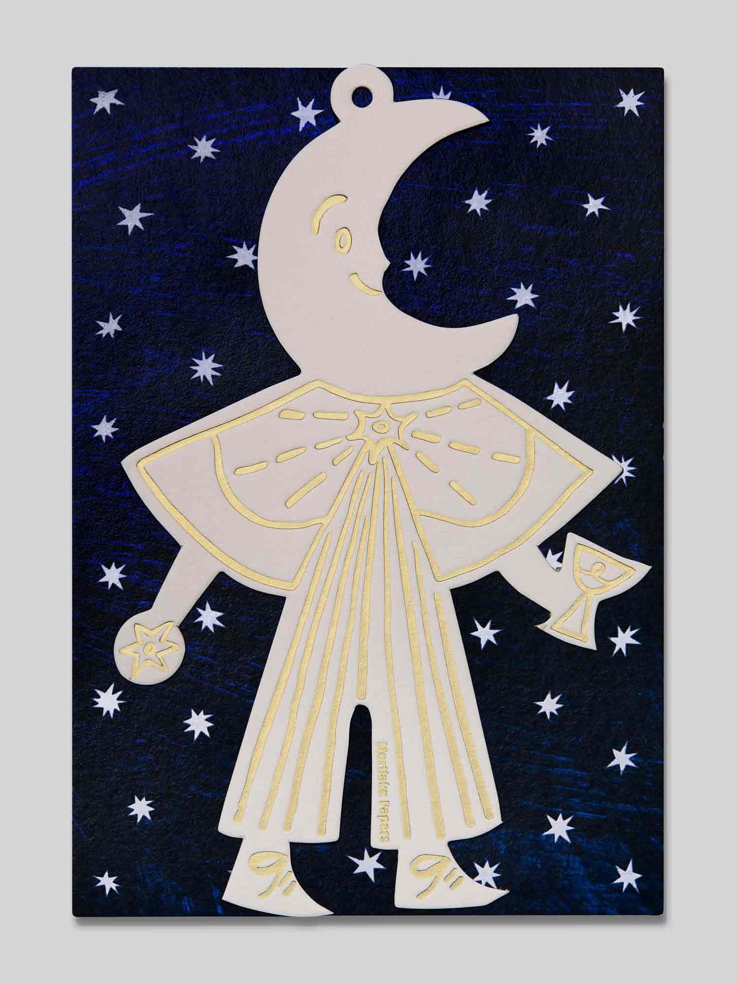 Celestial moon ornament on blue starry night eco packaging