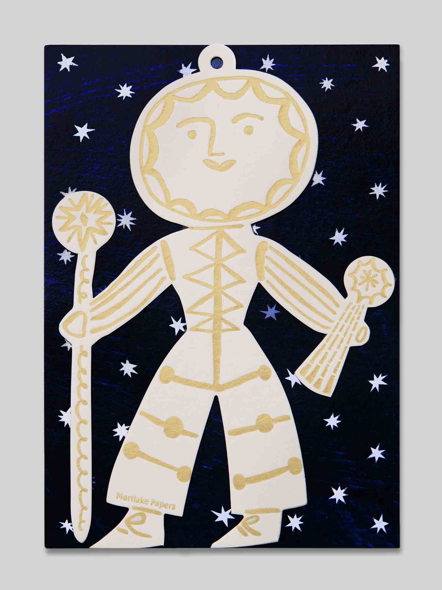 Sun folk figure in gold and white on dark blue starry night sky eco-friendly packaging