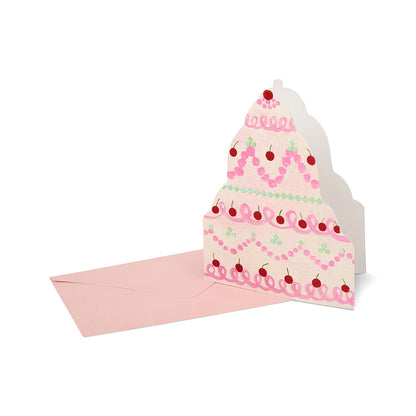 Card designed like a three-tiered wedding cake with pink frosting and red cherries on a white background.