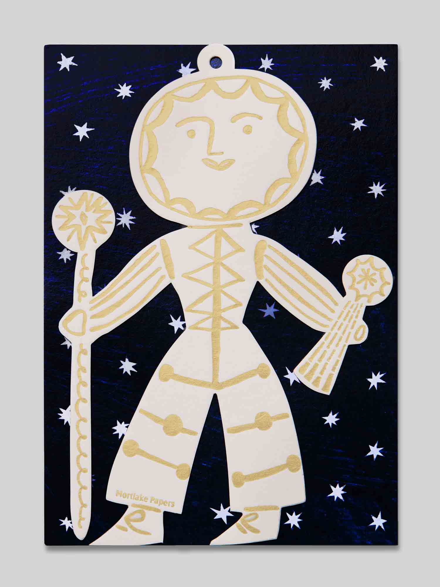 Sun folk figure in gold and white on dark blue starry night sky eco-friendly packaging