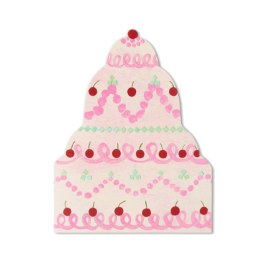Die cut birthday cake greetings card with pink frosting and cherries on a white background.
